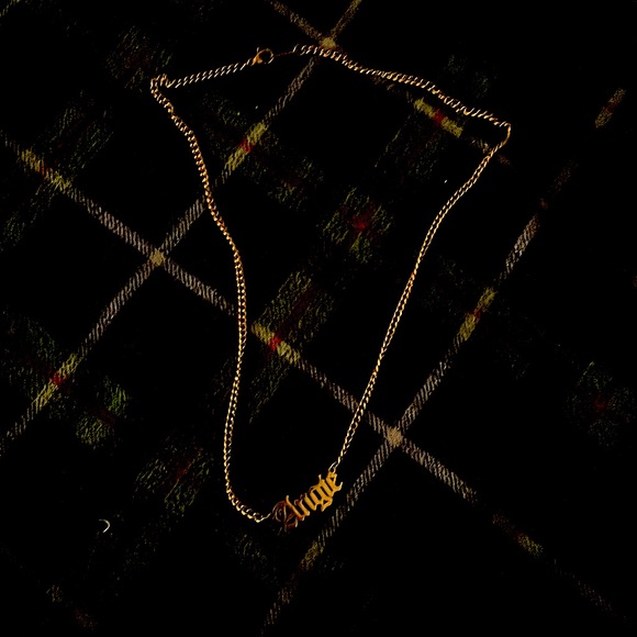 Necklace has the name (Angie)